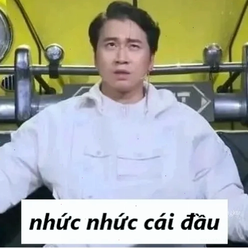 nhức đầu meme cười gượng